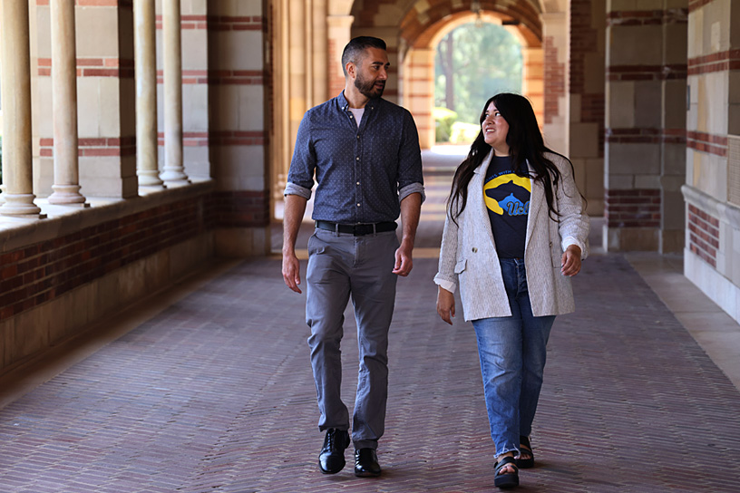 Two University of California instructors walking through campus